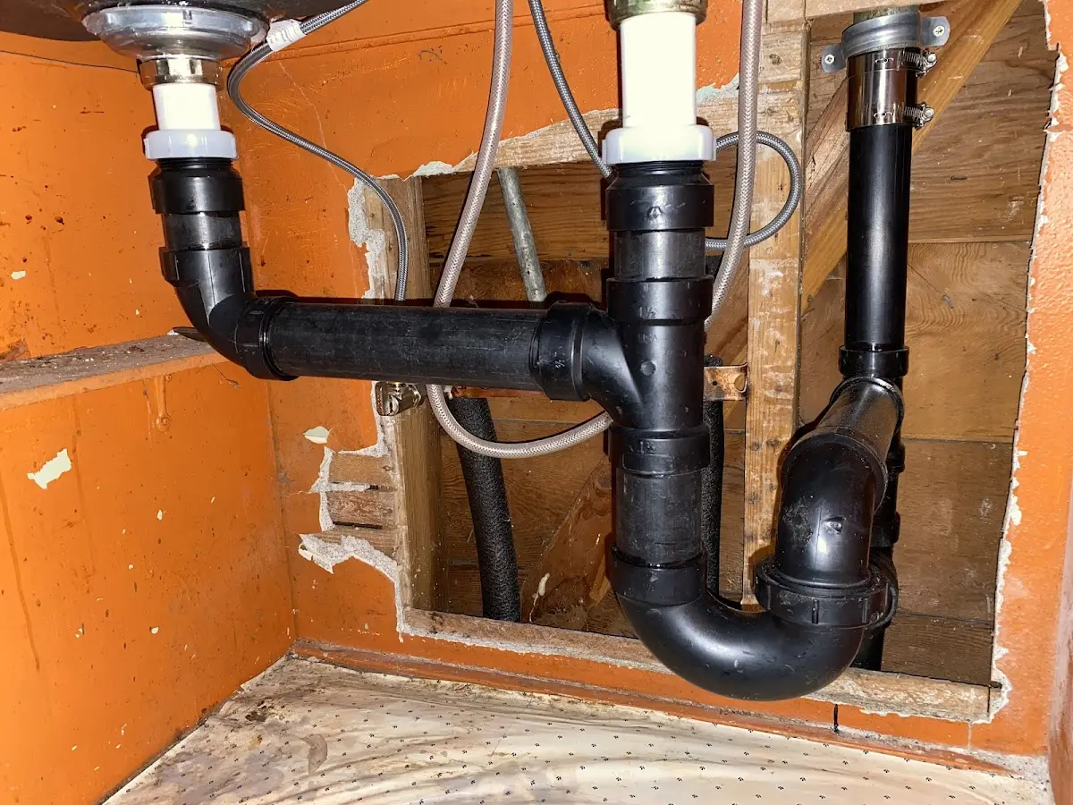 Professional Garbage Disposal Repair equipment and tools on the job in Sewanee